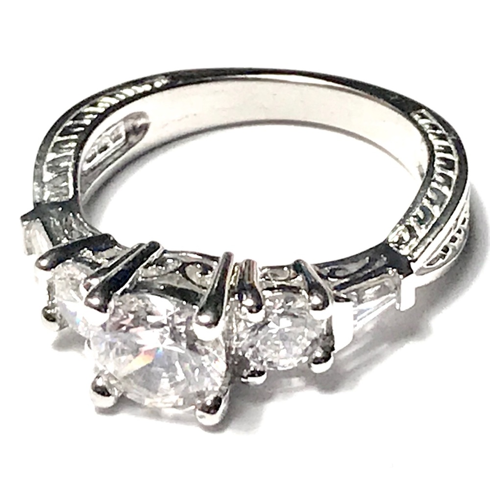 DIAMONIQUE THREE STONE RING